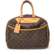 Louis Vuitton Deauville bowling bag for that perfect city look. Looks great on a tweed blazer over boyfriend jeans and New York red pumps.