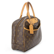 Louis Vuitton Deauville bowling bag for that perfect city look. Looks great on a tweed blazer over boyfriend jeans and New York red pumps.