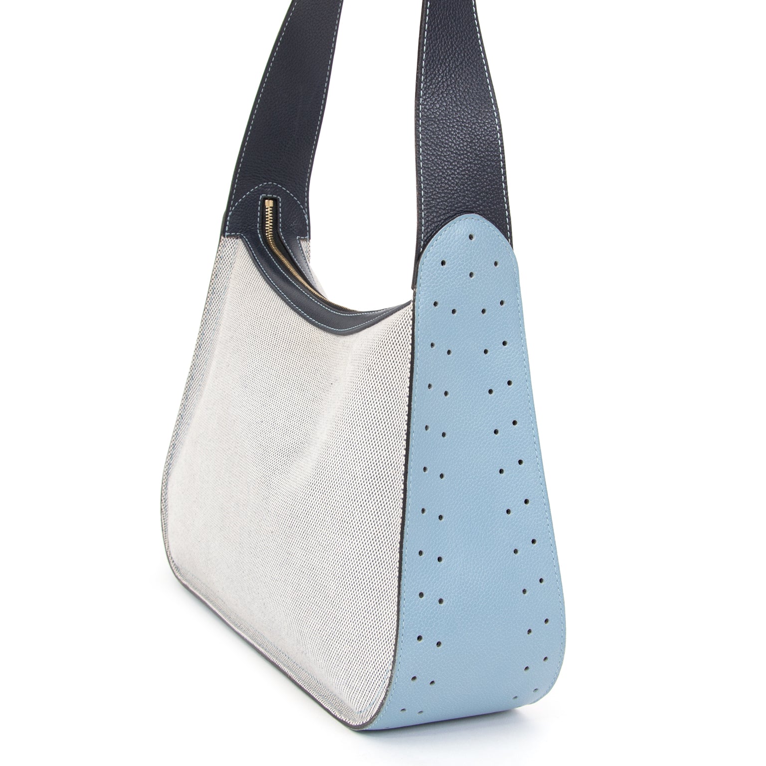 Delvaux Toile Hobo Bag Blue This fabric Delvaux hobo shoulder bag is both casual and ageless. Take this bag on a long walk at the seaside.