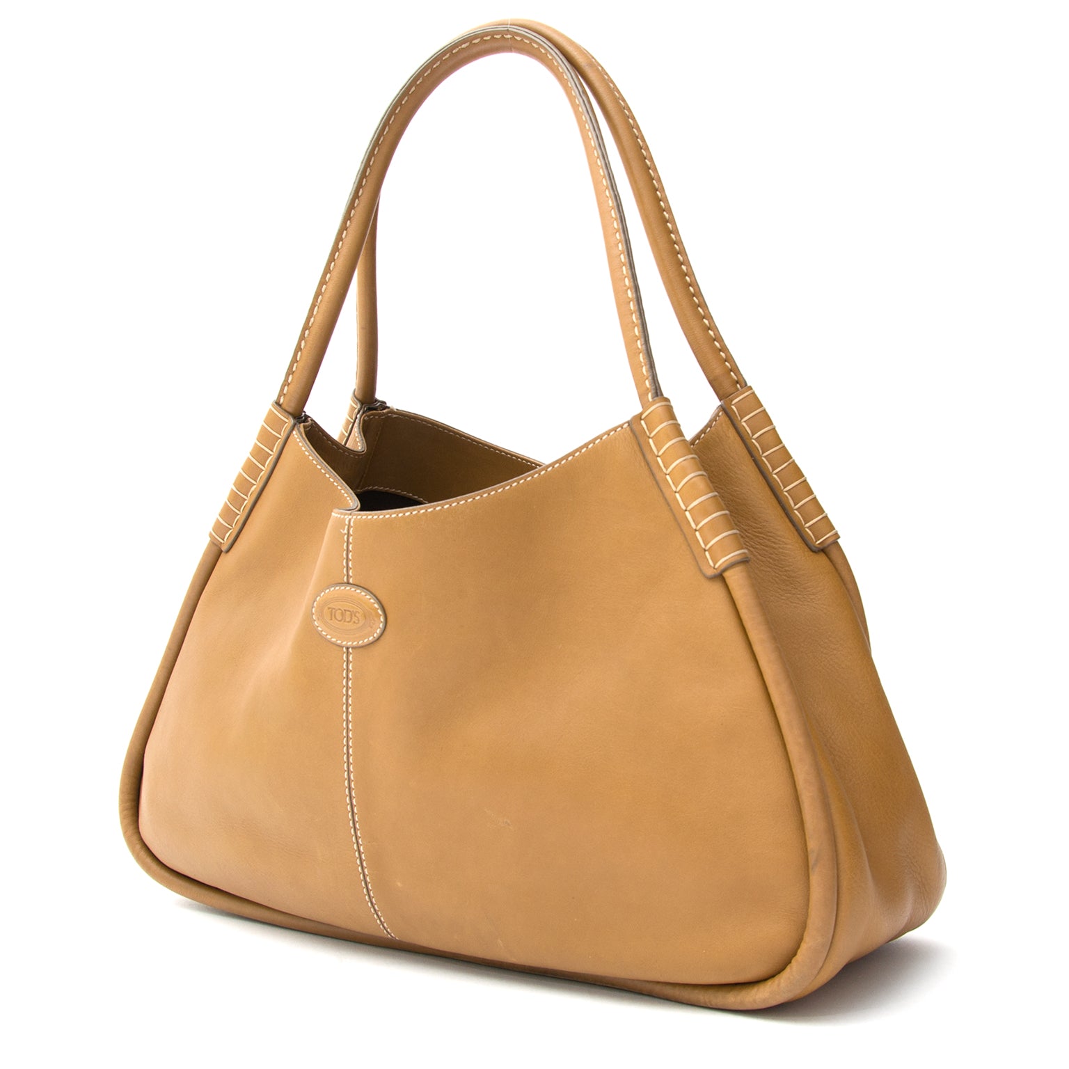 Tod's Cognac Hobo ShoulderbagAuthentieke tweedehands Tod's tas bij LabelLOV tegen de juiste prijs. Veilig online winkelen. Buy authentic secondhand Tod's bag at the right price at LabelLOV vintage webshop. Safe and secure online shopping.