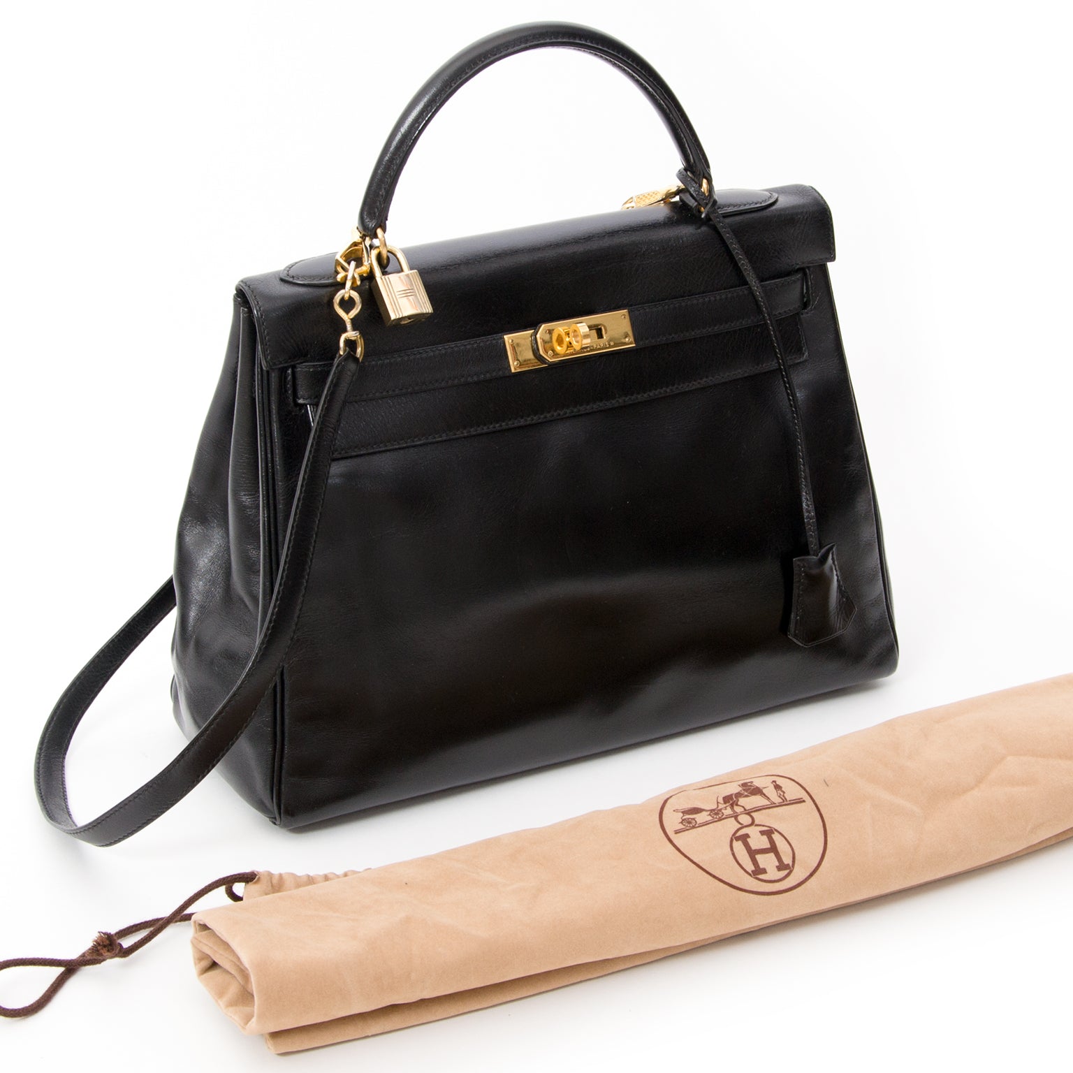 Hermès Kelly so black Bag With Shoulder Strap Black Box Calf acheter en ligne seconde main Hermes noir pour le meilleur prix site en ligne