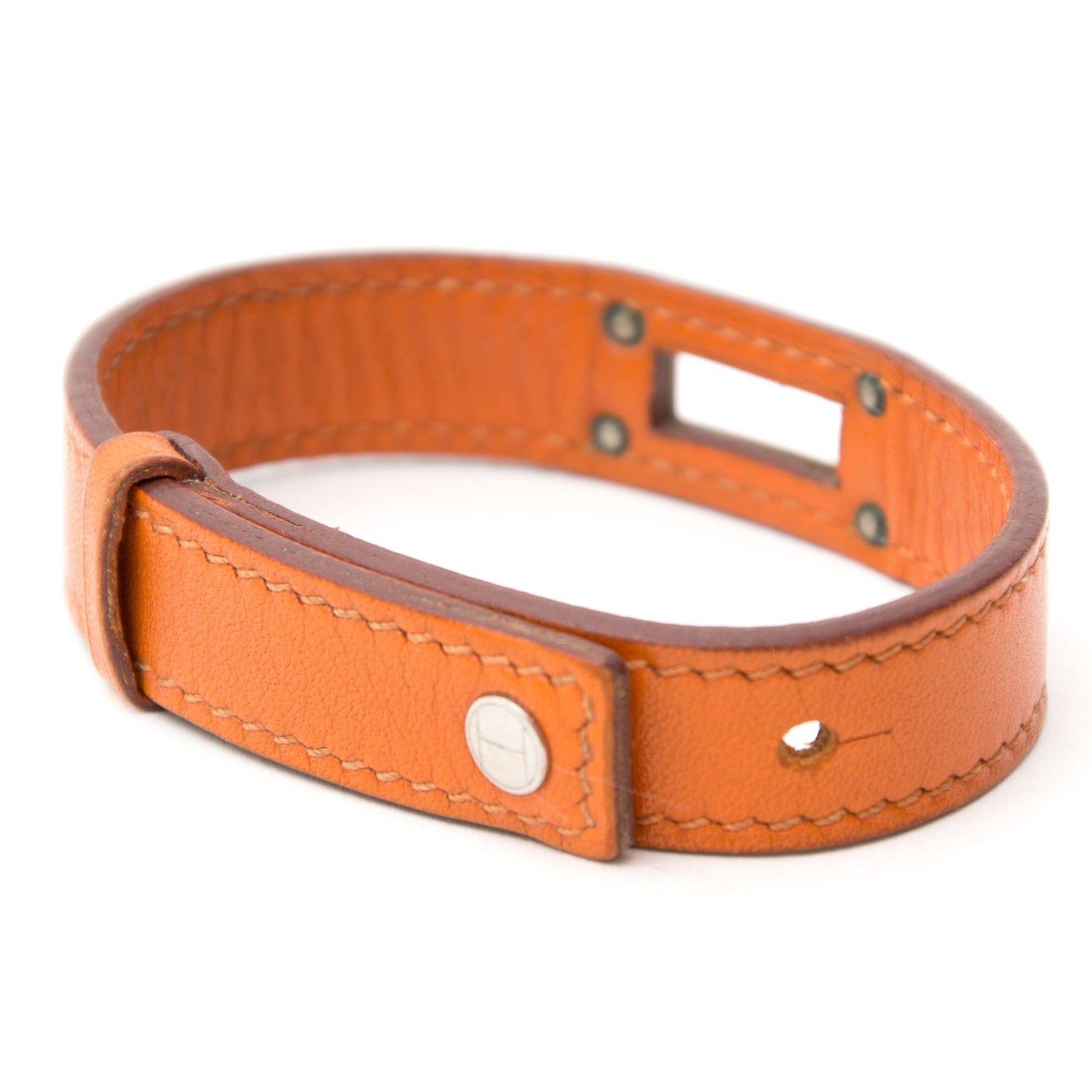 Buy authentic Hermès orange bracelet at the right price at LabelLOV vintage webshop. Luxe, vintage, fashion. Safe and secure online shopping. Antwerp, Belgium.