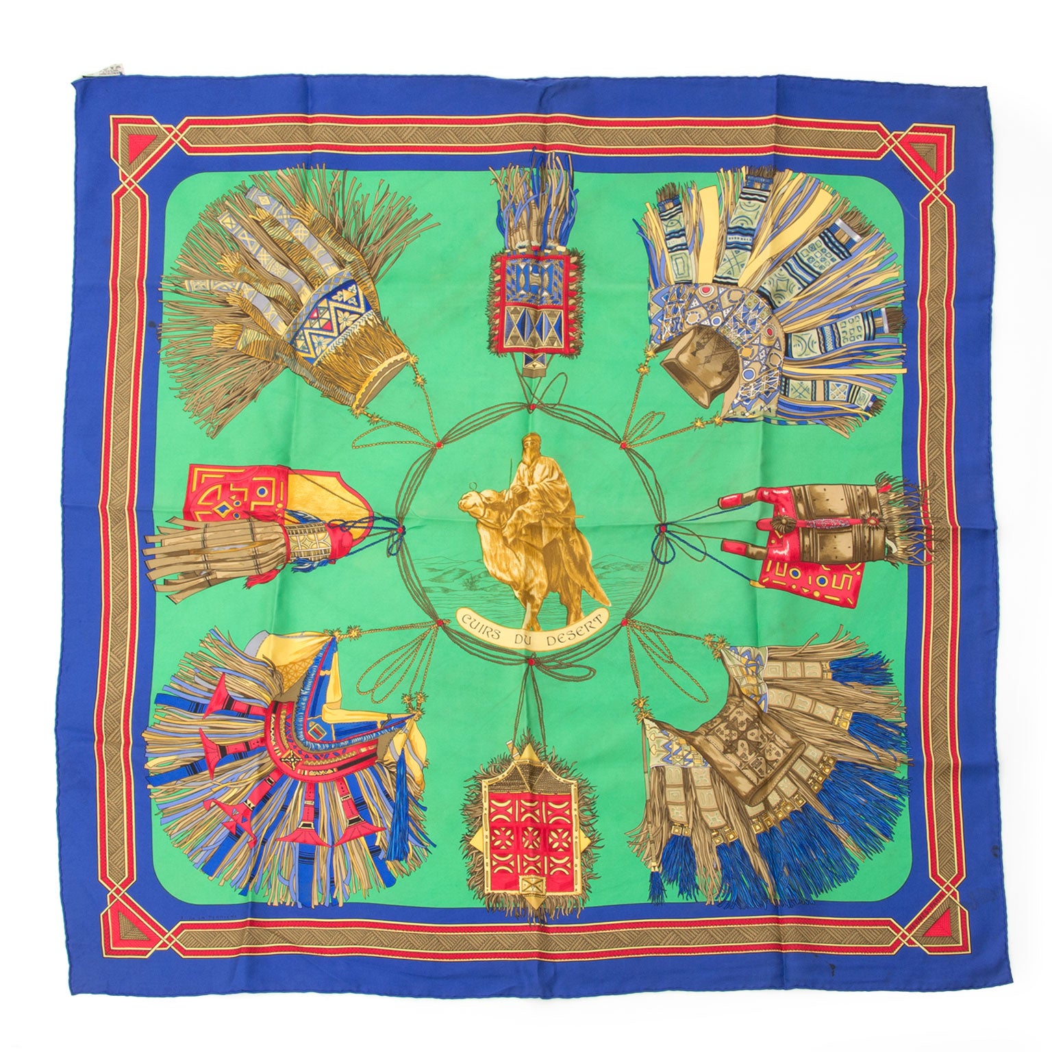 Preowned Hermès Silk Carré Scarf Cuirs Du Desert Green Blue. Buy authentic secondhand Hermès scarves at the right price at LabelLOV vintage webshop. Safe and secure online shopping. Koop authentieke tweedehands Hermès sjaals met de juiste prijs bij Lab