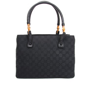 Vintage Gucci Black Fabric Monogram Bamboo Tote. shop now safe online international shipping