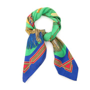 Hermès Silk Carré Scarf Cuirs Du Desert Green Blue Hermès silk 'Carré' scarf in vibrant green, red, gold and blue trim. Named 'Cuirs Du Desert' after it's berber leather work theme. A colorful classic!
