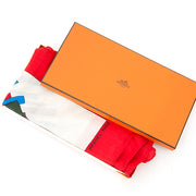 Hermès carré made from the softest cashmere and silk blend. Colors are predominantly red and bright blue.