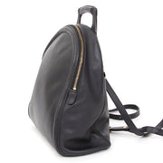 Sleek and stylish black leather Delvaux backpack with aged gold-tone zipper.