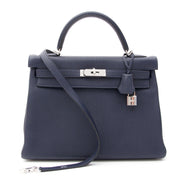 freshly bought from the Hermès store, made in 2015BRAND NEW Hermès Kelly Bag Taurillon Clemence 32 Blue Nuit