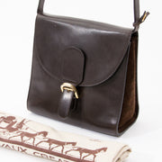 Delvaux Dark Brown Brillant Shoulder Bag Delvaux shoulder bag with suede sides and gold-tone hardware. Shoulder strap ajustable in height.