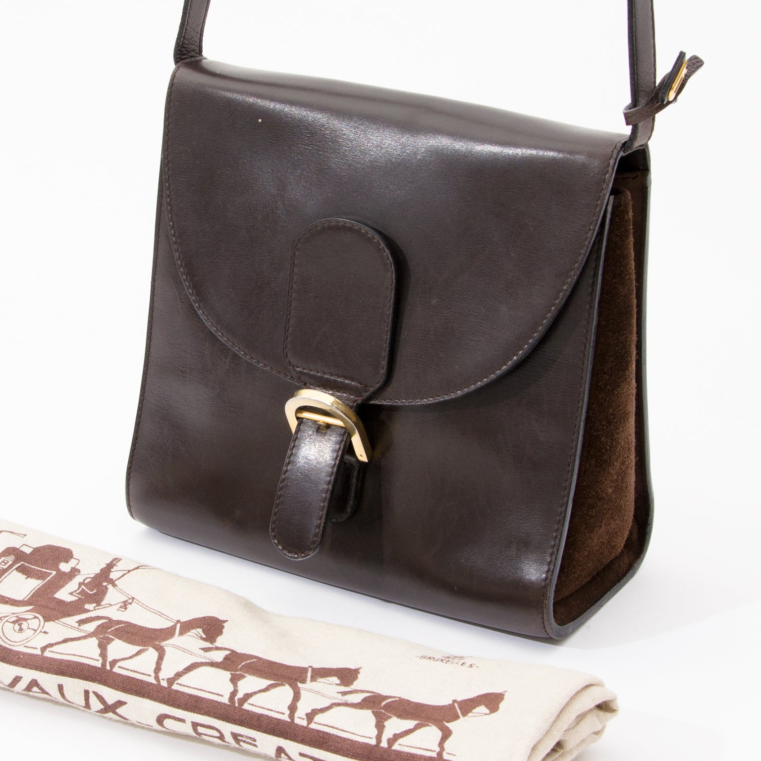 Delvaux Dark Brown Brillant Shoulder Bag Delvaux shoulder bag with suede sides and gold-tone hardware. Shoulder strap ajustable in height.
