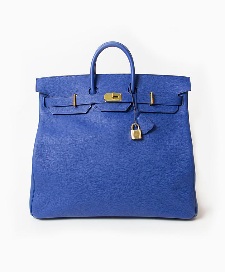 New Hermès HAC Haut à Courroies 50cm Togo Blue Electrique GHW. Buy and sell authentic secondhand hermes bags at the right price at LabelLOV vintage webshop. Safe and secure online shopping. Koop authentieke tweedehands Hermes tassen bij LabelLOV.
