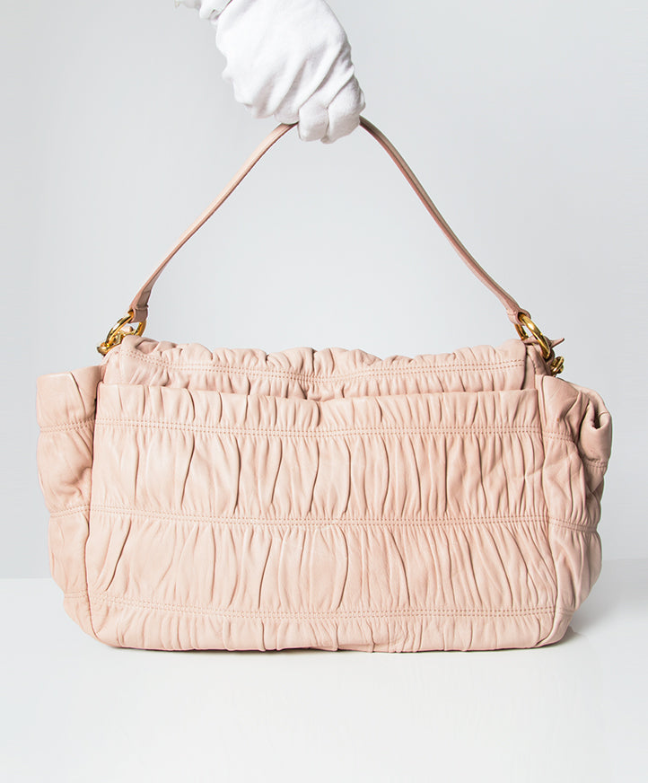 Sac épaule cross body blush pink rose cuir Prada Dressy Gauffre seconde main occasion authentique originale designer vintage webshop labellov marques de luxe online en ligne prix correct Anvers Belgique