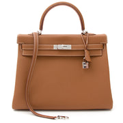 BRAND NEW Hermès Kelly Bag Togo Gold PHW Koop veilig online net als nieuw 100% authentieke Hermes Kelly bag with strap.