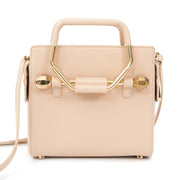 Viktor & Rolf Mini Bombette Bag Nude This Viktor & Rolf handbag with angular metal handles might be petite but it will attract many looks. Optional, adjustable cross-body strap. Comes with dustbag.