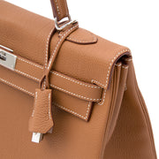 BRAND NEW Hermès Kelly Bag Togo Gold PHW authentic luxury wordwide shipping