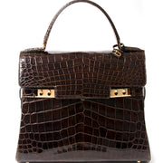 Delvaux Black 'Cerceau' Jumping Backpack. Buy authentic secondhand designer bags at the right price at LabelLOV vintage webshop. Safe and secure online shopping. Koop authentieke tweedehands designer tassen bij LabelLOV webwinkel.