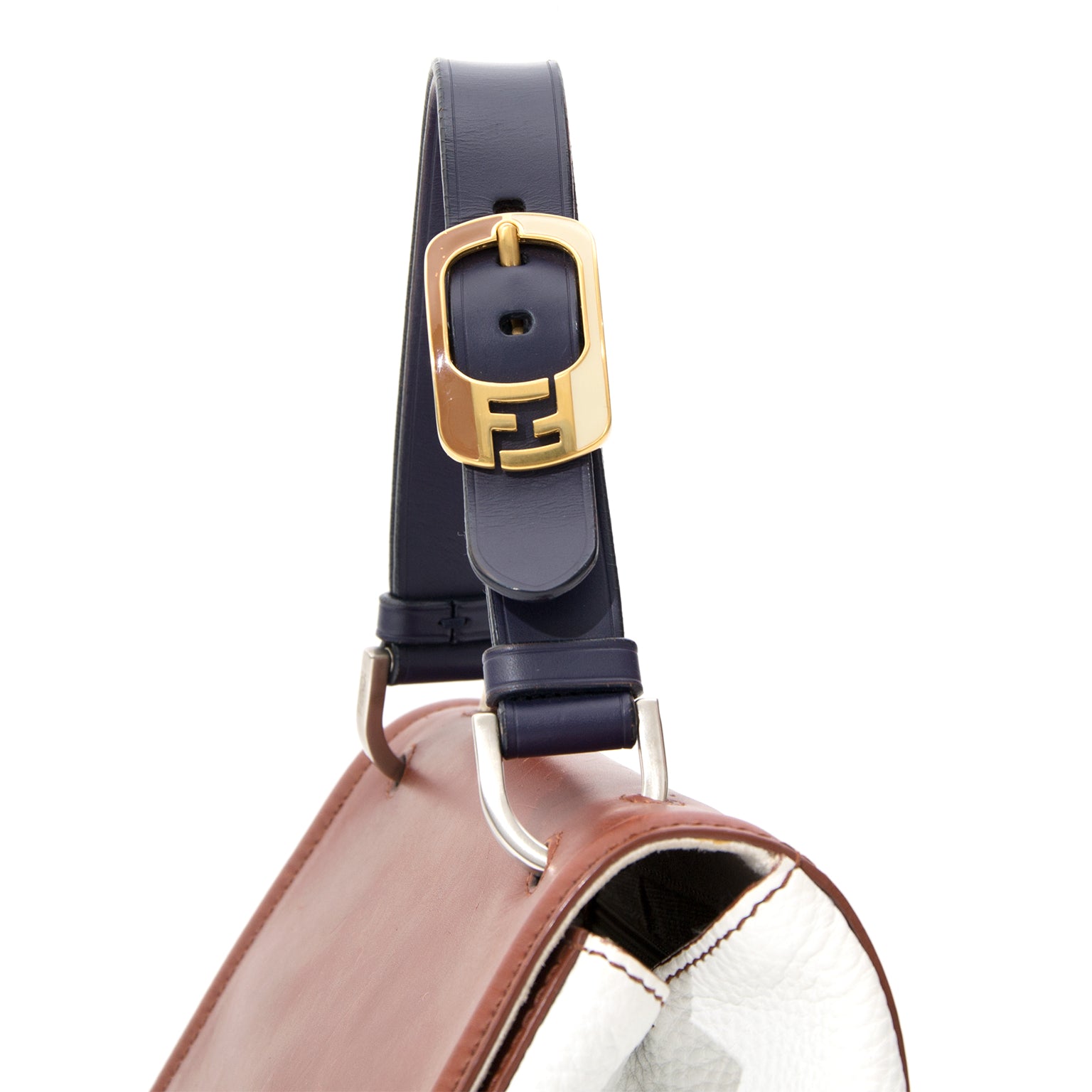 This Fendi purse is a structured top handle handbag in tri-color-block, off-white, fox and navy blue.