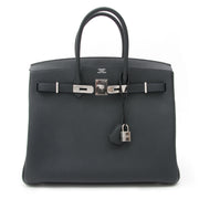 Absolutely gorgeous, brand new, storebought Hermès Birkin bag in one of the top trending colors of lately: Blue Océan, a petroleum blue hue. Blindstamp 'R' in a square, handcrafted in 2014. Paladium hardware throughout. The bag is complete with cloc