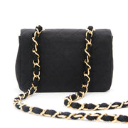 Chanel Silk Evening Purse On A Chain Mini Chanel flap bag made from quilted silk with long gold-tone and silk entwined shoulder strap.