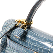 koop snel en veilig tweedehands Hermes kelly 32 blue jean in croco leer net als nieuw tweedehands