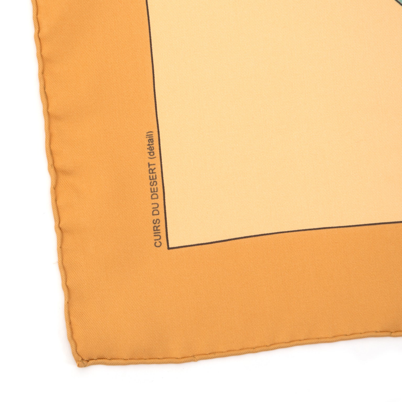 Hermès Silk Carré Scarf Orange Cuirs du Desert Buy authentic secondhand Hermès scarves at the right price at LabelLOV vintage webshop.