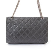 Chanel 2.55 Quilted Lambskin Classic Flap Bag This is an authentic quilted lambskin Chanel 2.55 Flap Bag with Classic turnlock and chain straps.