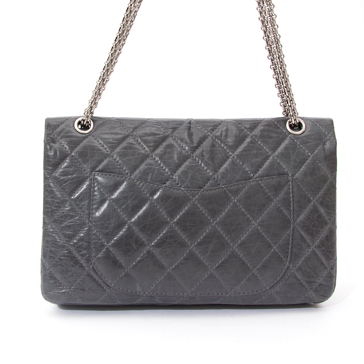 Chanel 2.55 Quilted Lambskin Classic Flap Bag This is an authentic quilted lambskin Chanel 2.55 Flap Bag with Classic turnlock and chain straps.