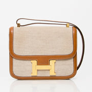 tweedehands authentieke hermes constance schouder tas met canvas body en lederen detail, gouden H gesp