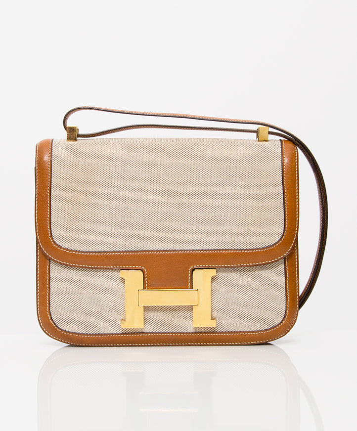 tweedehands authentieke hermes constance schouder tas met canvas body en lederen detail, gouden H gesp