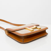 Authentieke tweedehands Hermès Constance toile canvas en leer goud schoudertas juiste prijs veilig online winkelen labelllov vintage webshop luxe designer merken Antwerpen winkelen mode België