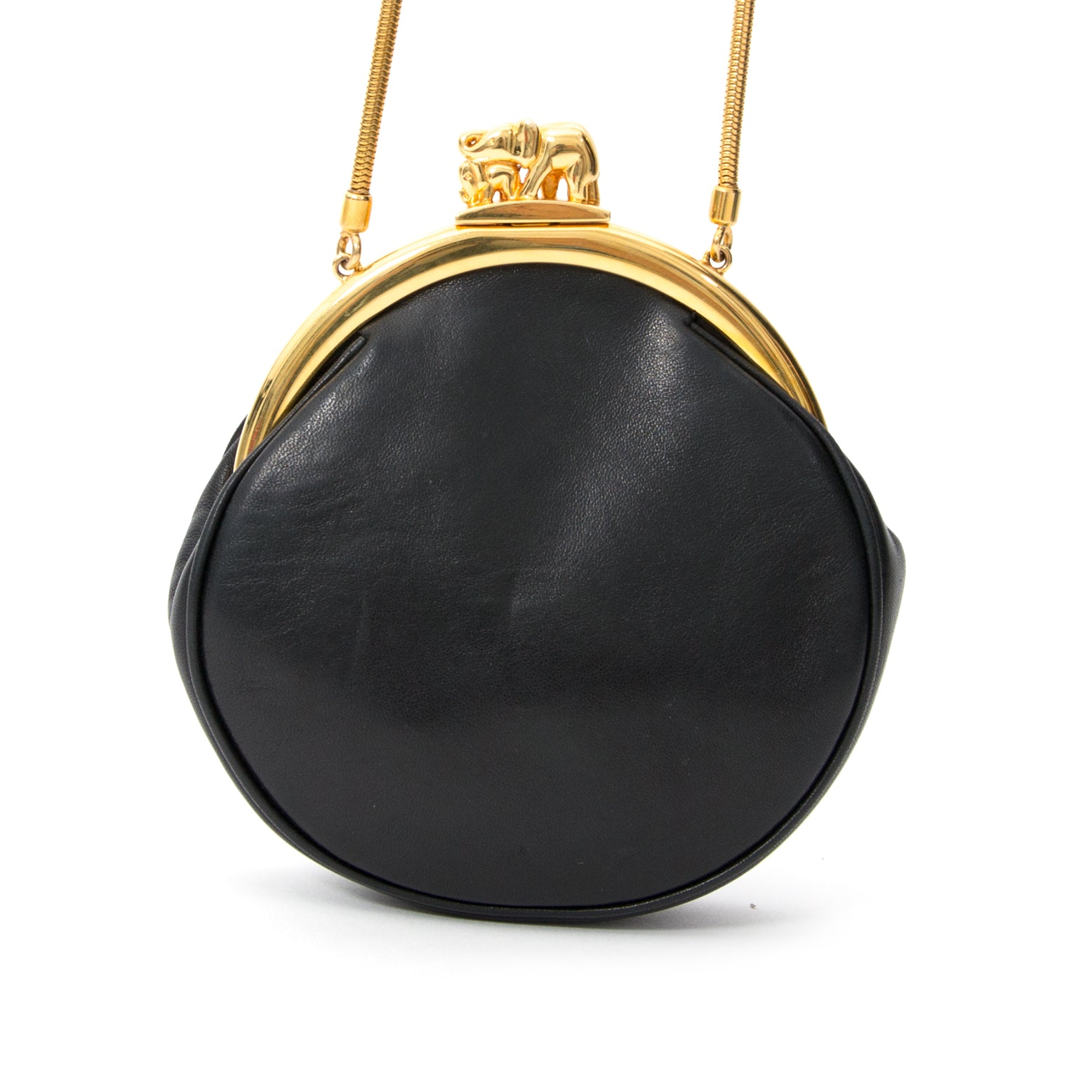 From the 'Collections Privées de Cartier', a limited edition bag made to celebrate Cartier' 150 yr anniversary in 1997. Super rare find: this 'Sac Panthère' is a round clutch in soft black lambskin, with goldtone clasp closure and cocoon link chain. Two