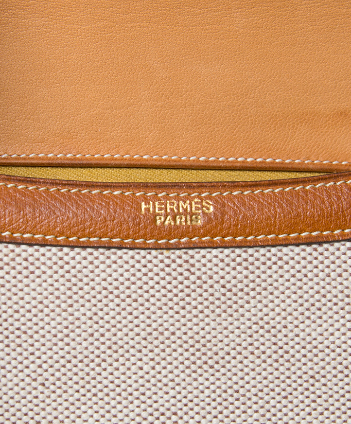 Authentic Exquisite and rare Hermes Constance shoulder bag with leather trimming and toile body.