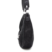 This is a Delvaux hobo shoulder bag in black nubuck with brushed steel hadrware. Zipper closure. Comes with receipt of purchase and leather treatment information.