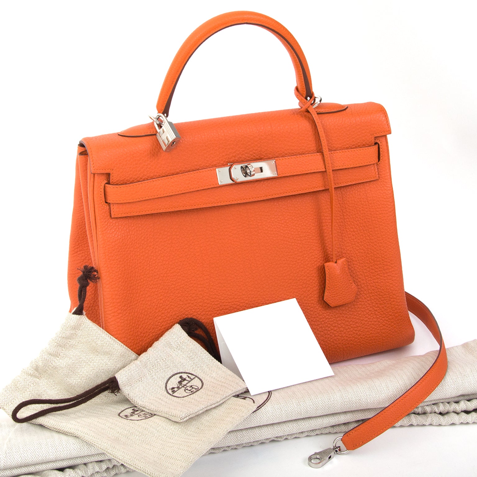 shop online Hermes Orange Kelly 35 Retourne Veau Togo in perfect condition at the best price