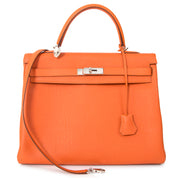 shop online Hermes Orange Kelly 35 Retourne Veau Togo in perfect condition at the best price