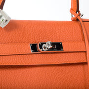 acheter en linge comme neuf pour le meilleur prix Hermes Orange Kelly 35 Retourne Veau Togo