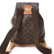 Made by the iconic French brand, the vintage Louis Vuitton bag is a throw over the shoulder style backpack; both practical and chic. Crafted from high quality leather, the brown and camel coloured, monogrammed canvas is filled with signature 'LV' logos.