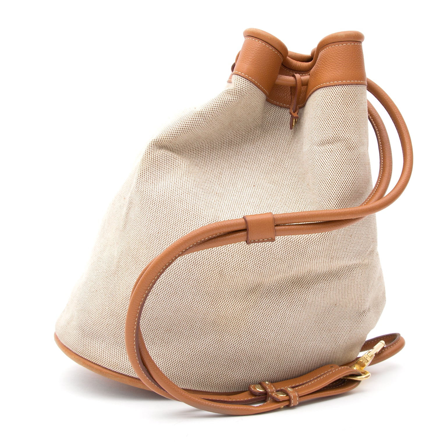 Delvaux Togaie Sahara Canvas Bucket Bag For designer brands such as Louis Vuitton, Hermes, Chanel, Delvaux and many more, visit the online platform Labellov. The website offers a safe and secure platform to sell and buy new or prel