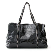 Preowned Chanel Patent Luxe Ligne Tota Bag. Authentic secondhand designer bags at LabelLOV webshop. Safe and secure luxury vintage shoppen. Tweedehands luxe merken online aan de juiste prijs.