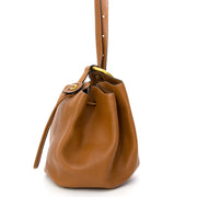 Vintage Delvaux Vent des Roses Cognac Bucket Bag. Buy authentic secondhand Delvaux bags at the right price at LabelLOV vintage webshop