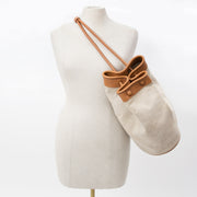 Delvaux Togaie Sahara Canvas Bucket Bag buy safe online secondhand designer vintage shoulder bag