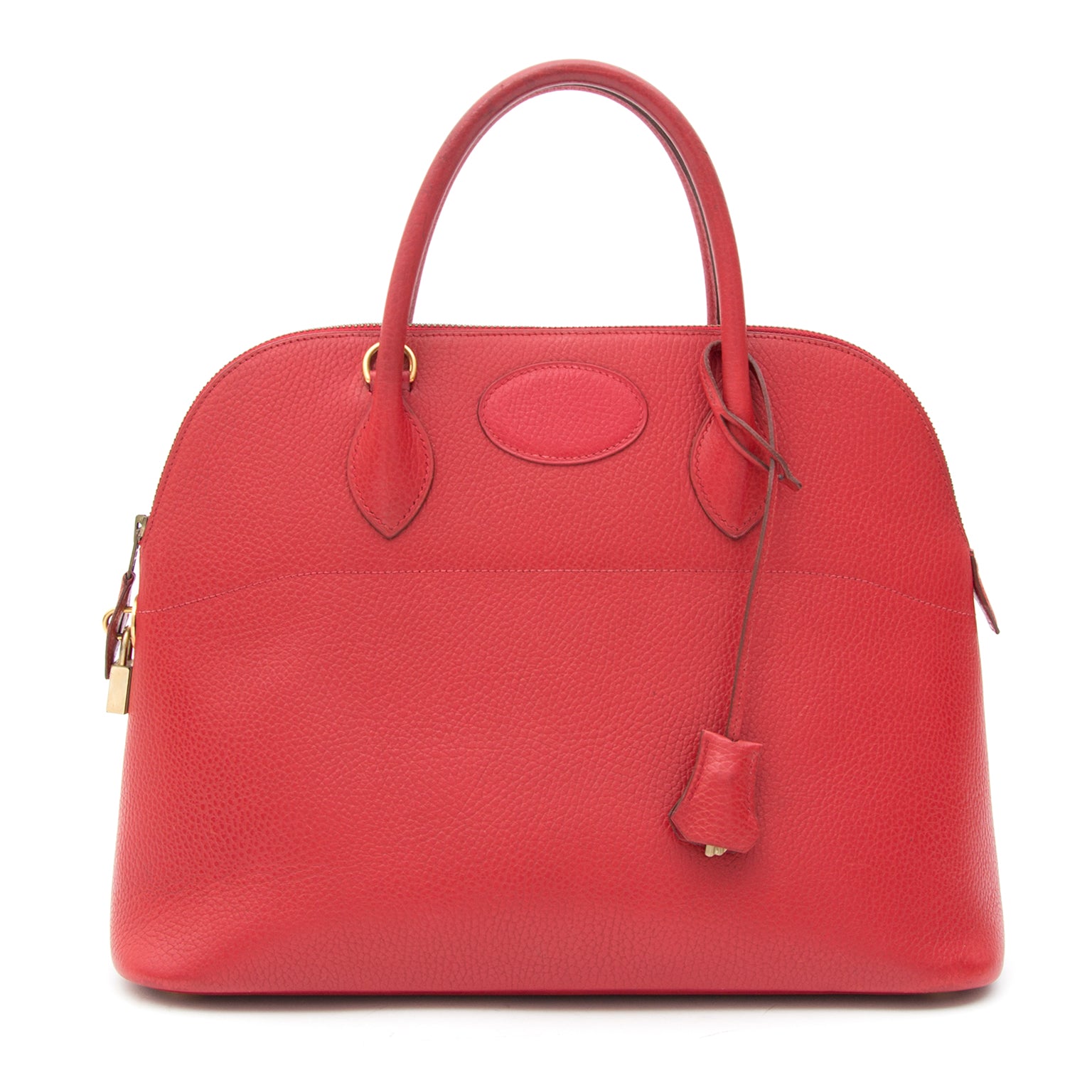 Pre-owned Hermès Bolide Top Handle Bag Red GHW. Acheter secure seconde main 100% authentic sac a main Hermes Bolide en cuir d'or. Koop veilig online tweedehands luxe handtas Hermes Bolide.