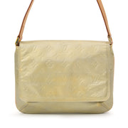 Louis Vuitton Thompson Street The Louis Vuitton Thompson Street is a practical shiny pearl. This bag comes with leather hand straps and man-made lining. When Hilary Duff meets Material Girls, you meet your Thompson street.