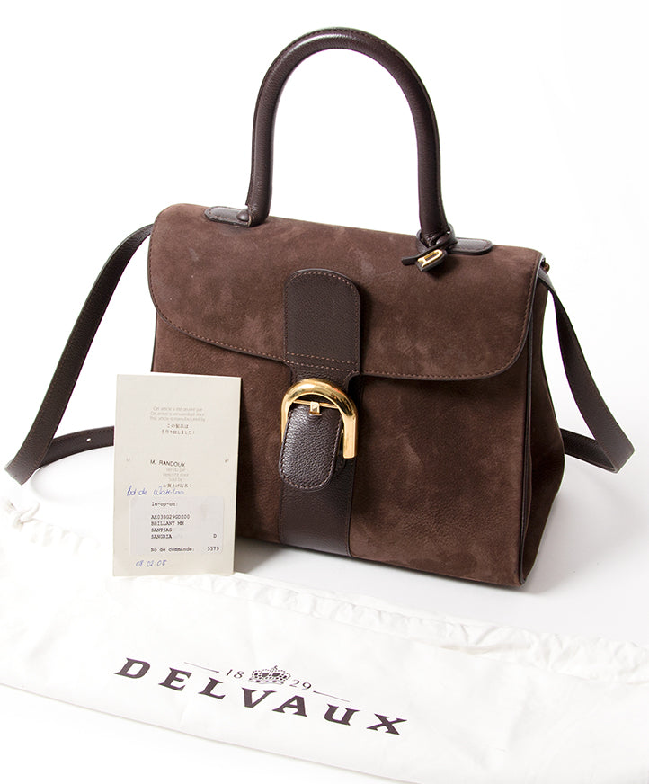 Delvaux Brillant MM Dark Brown Nubuck GHW Buy authentic secondhand Delvaux bags at the right price at LabelLOV vintage webshop. Safe and secure online shopping. Koop authentieke tweedehands Delvaux tassen met juiste prijs bij LabelLOV.