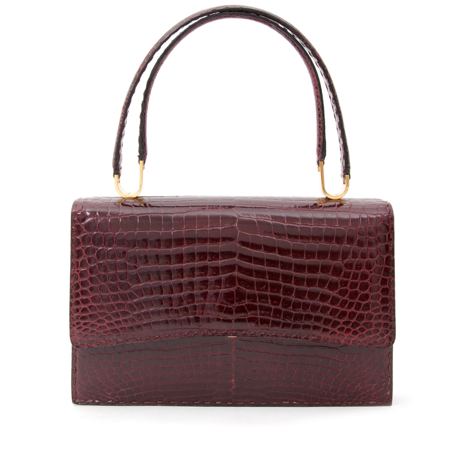 Delvaux Burgundy Croco Shoulder Bag Voor designer merken zoals Louis Vuitton, Hermes, Chanel, Delvaux en anderen bezoek de online platform Labellov. De website biedt een veilige en betrouwbare platform voor het kopen en verkopen van nieuwe en tweedehands