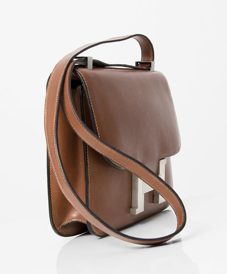 Authentieke tweedehands bruine Hermès Constance schoudertas PHW juiste prijs veilig online winkelen labellov webshop designer vintage luxe merken Antwerpen shopping België