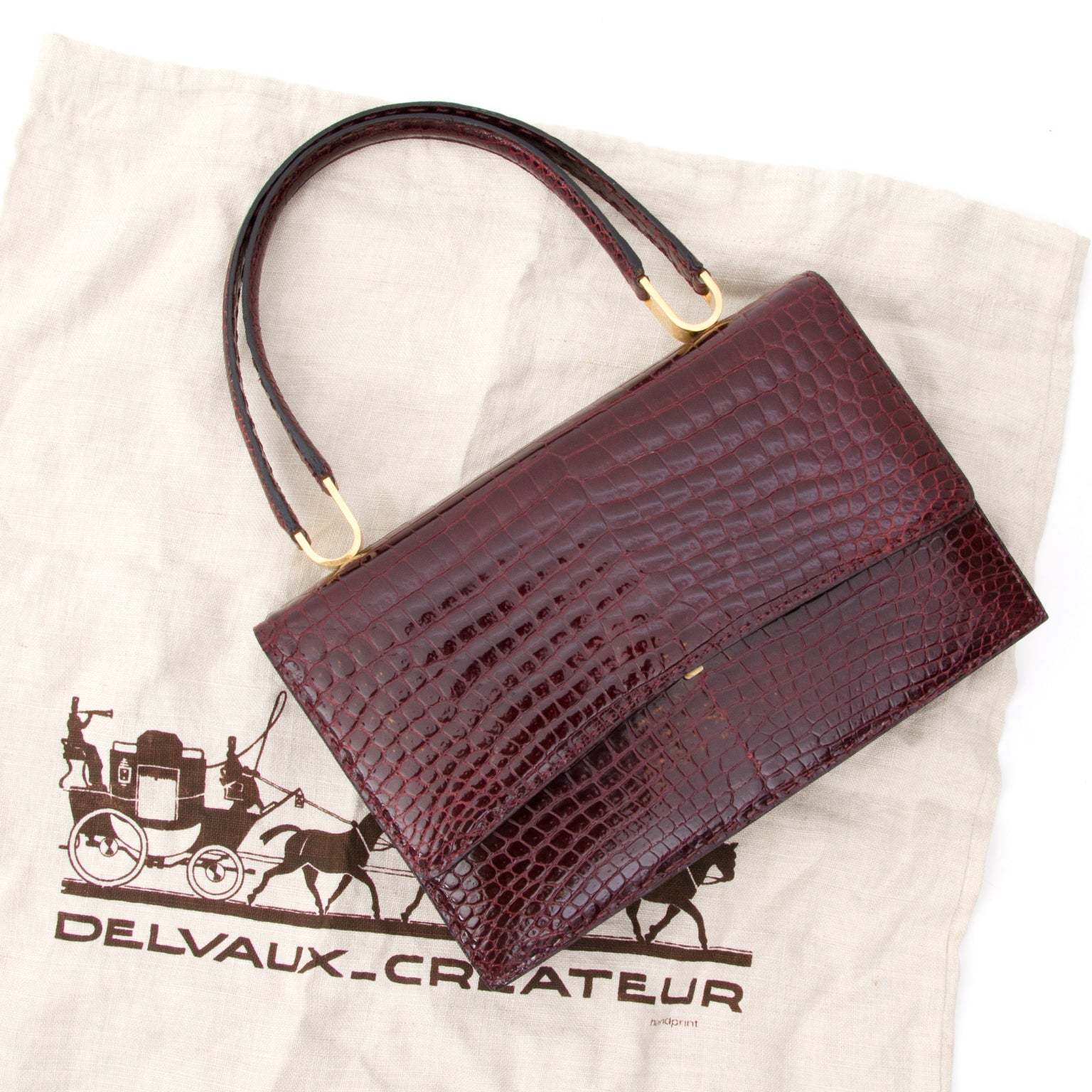 Delvaux Burgundy Croco Shoulder Bag For designer brands such as Louis Vuitton, Hermes, Chanel, Delvaux and many more, visit the online platform Labellov. The website offers a safe and secure platform to sell and buy new or preloved luxurious bags.