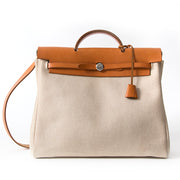 Hermès Herbag Cognac & Toile 2 in 1 authentic secondhand safe online shopping webshop fashion style LabelLOV Antwerp Belgium high end luxury labels brand designer