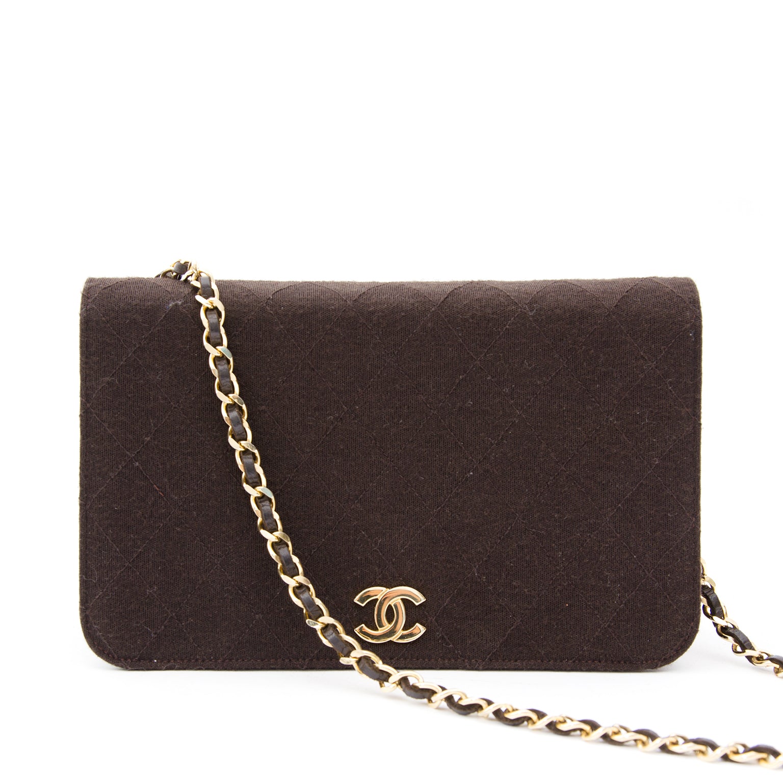Chanel Brown Quilted Fabric Flap Bag i Chanel flap bag made from quilted silk with long gold-tone wool entwined shoulder strap.