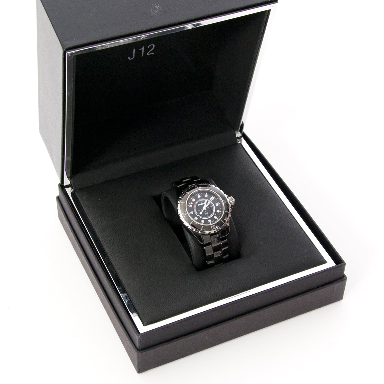 Chanel J12 Black Womens Watch Black obsidian cermaic wristband and diamond excrusted clockwork. Model N° H1625 Serial N° DK 26302 Certificate N° 13044439
